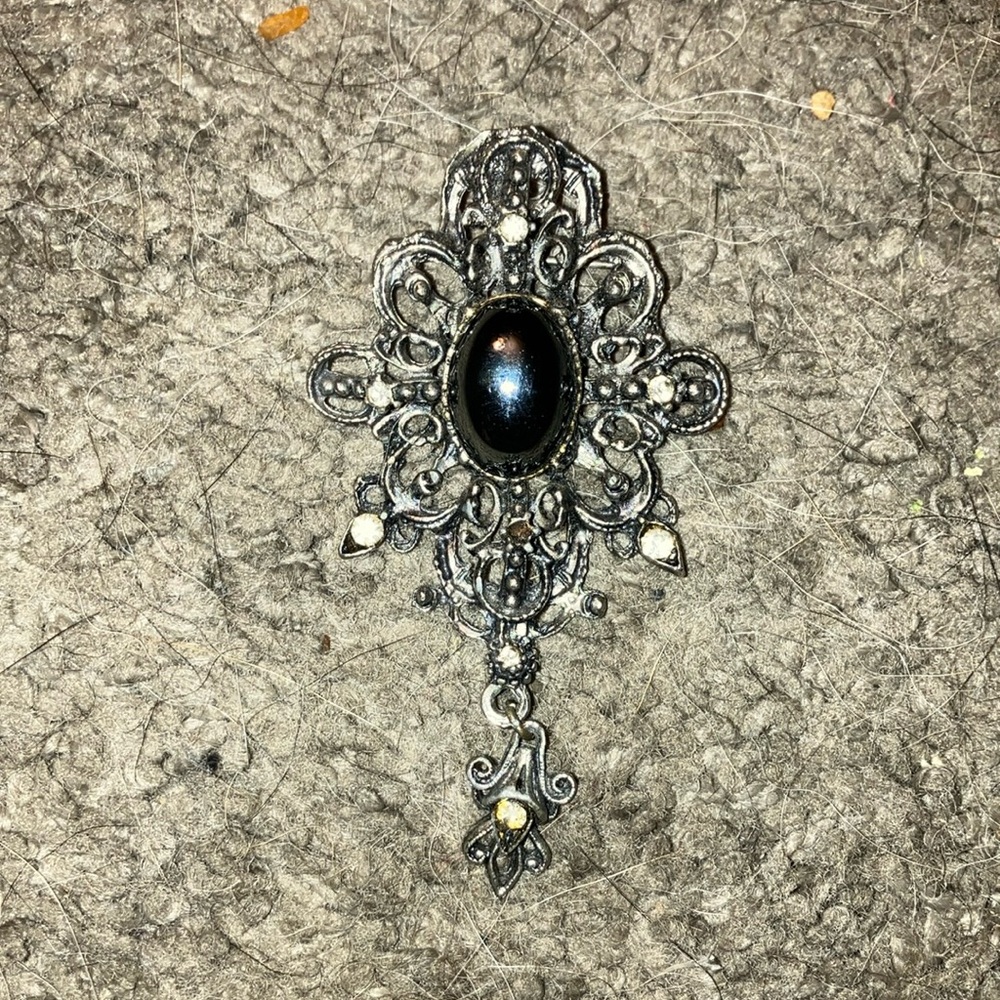 Dark gothic brooch pin with black stone and silver details